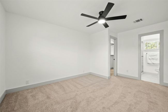 There are several options on where furniture can be placed in this spacious owner's suite. | Image 19