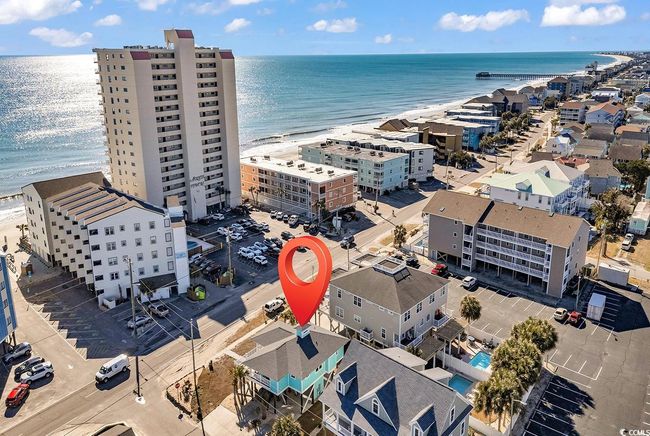 Aerial view featuring a water view and a view of the beach | Image 32