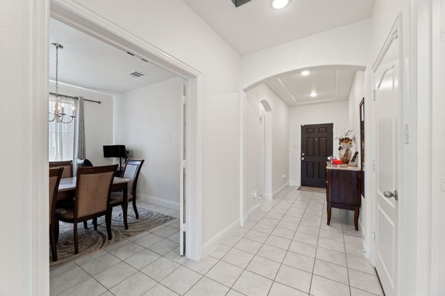 Hallway featuring recessed lighting, arched walkways | Image 4
