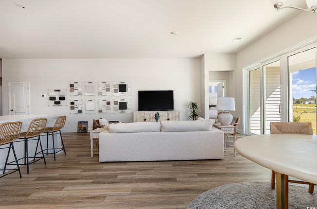 Living room featuring light wood finished floors | Image 17