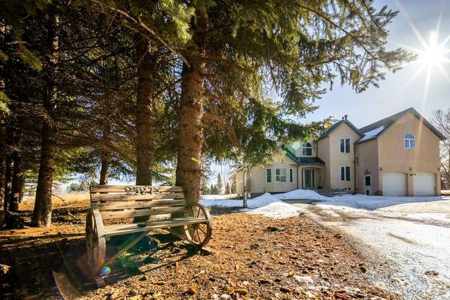 25273 Lower Springbank Road, Home with 3 bedrooms, 2 bathrooms and 6 parking in Rural Rocky View County AB | Image 2