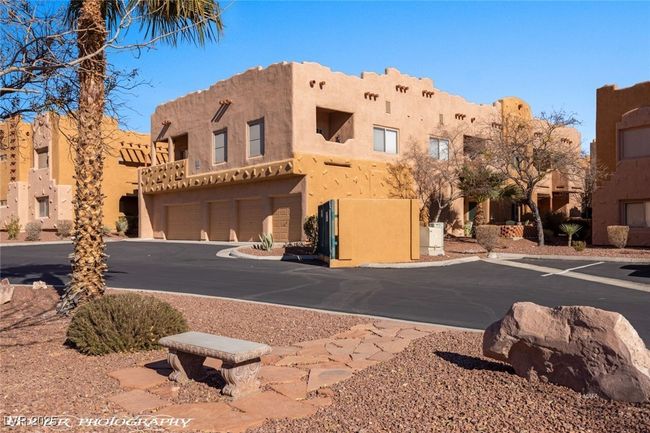 View of property featuring a garage | Image 50