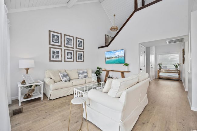 featuring new furniture, floors, paint, shiplap ceilings | Image 4