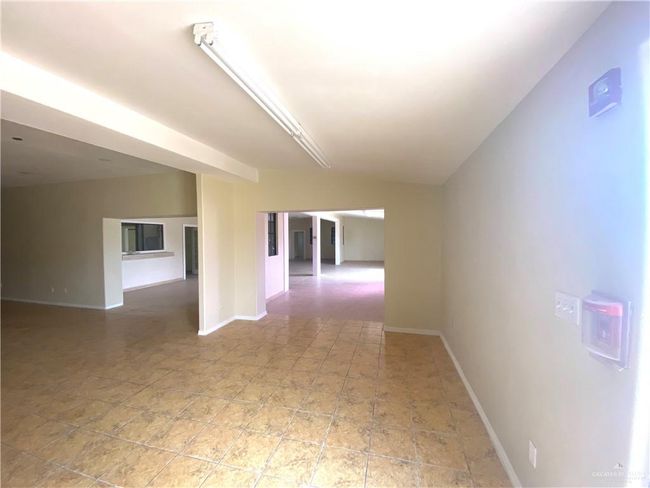 View of tiled spare room | Image 17