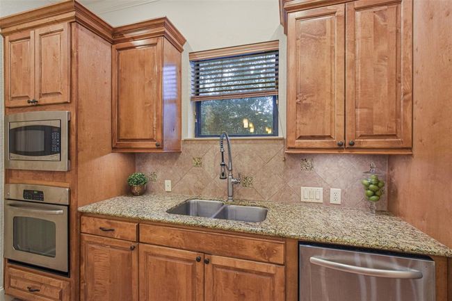 Under cabinet and overcabinet lighting. Plus, you are going to love the window above the sink. | Image 22