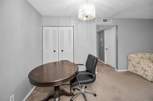 Dining area and closet | Image 17