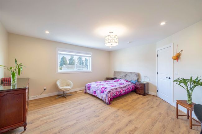 Bedroom featuring recessed lighting, baseboards, and light wood finished floors | Image 16
