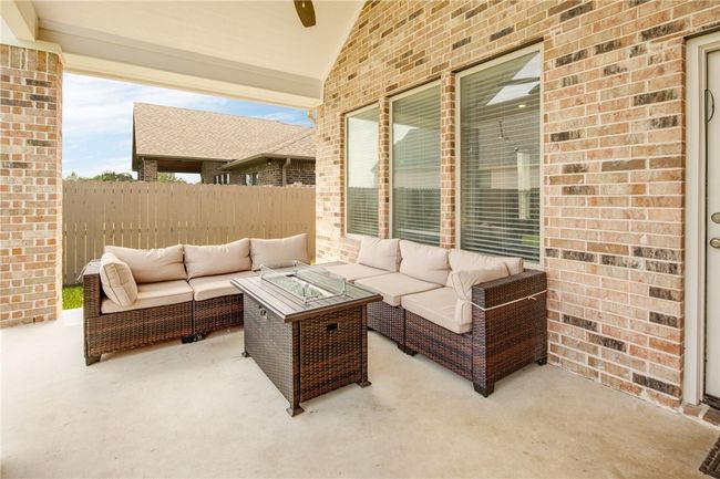 View of patio with outdoor lounge area | Image 20