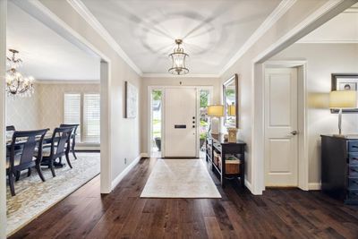 Oversized formal entry with crown molding and natural light | Image 2