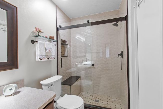 A closer look at the walk-in shower. | Image 15