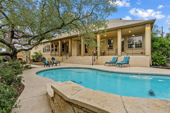 Back of swimming pool looking onto the back porch | Image 29