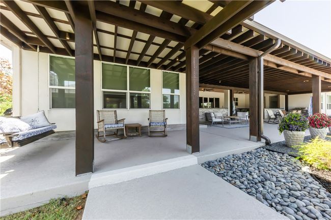 View of patio / terrace with ceiling fan | Image 29