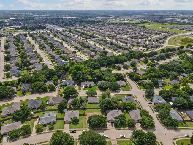 Aerial view of property's location with nearby suburban area | Image 31