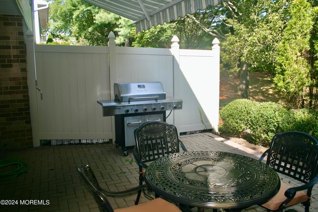 Large private patio with large awning | Image 19