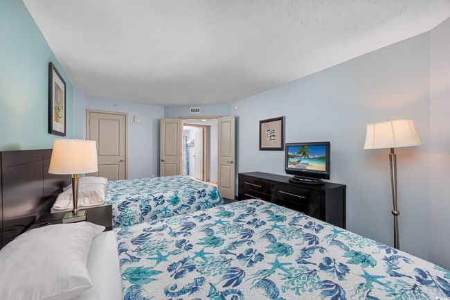 Bedroom featuring a textured ceiling | Image 16