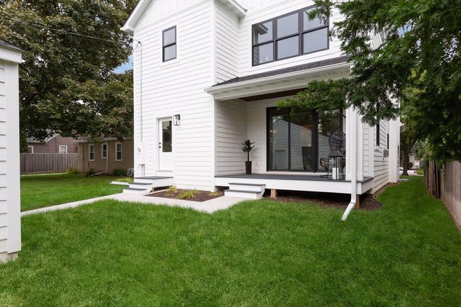 Covered rear porch. Pictures of previously built house. | Image 29