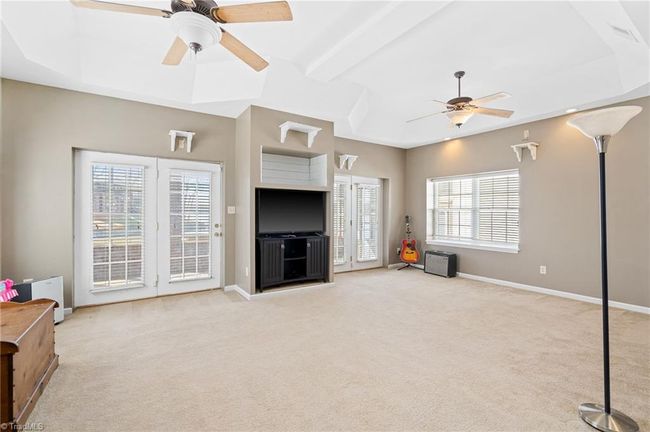 Spacious family room with double french doors leading to the screen porch....what will you do with all this space? | Image 30
