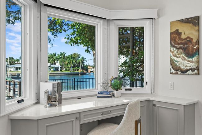 work nook off of kitchen overlooking water | Image 23