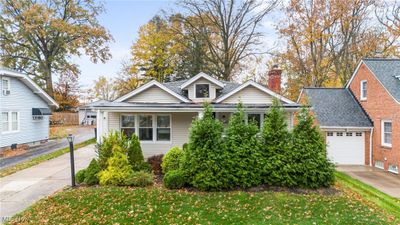 View of front facade featuring a garage | Image 1