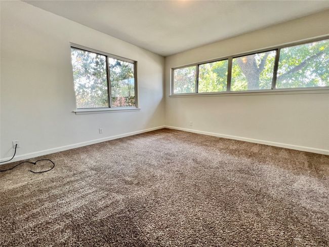 Spare room with baseboards and carpet flooring | Image 18