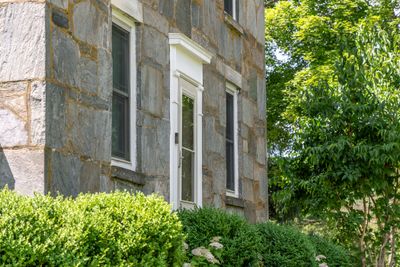 Center front entry door with marble sill | Image 3