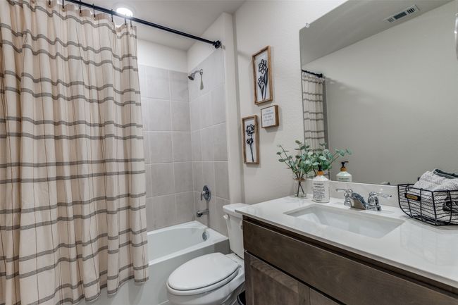 Full bath featuring toilet, shower / tub combo and single bowl vanity with undermount sink. | Image 19