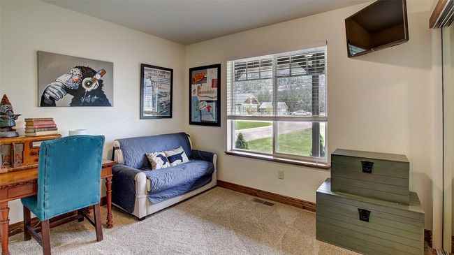 Carpeted office space featuring baseboards | Image 26