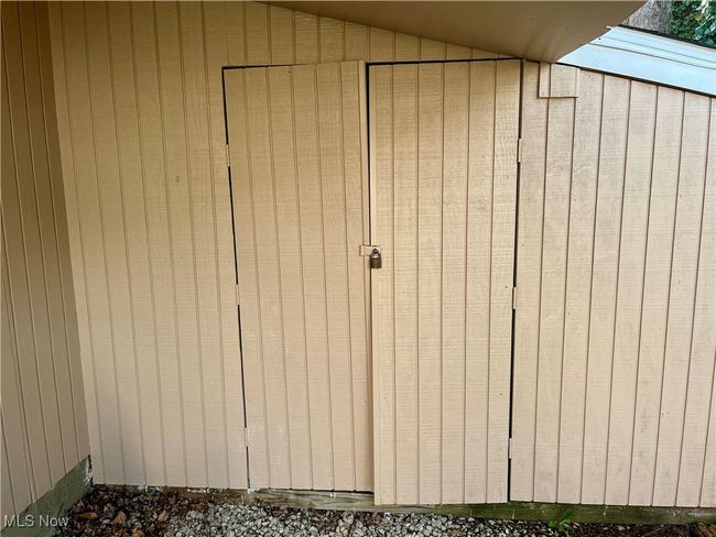 View of garage-attached shed and​​‌​​​​‌​​‌‌​‌‌​​​‌‌​​‌‌​‌​​​​​‌ storage | Image 35