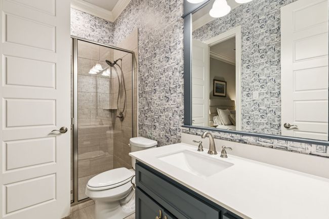Full bathroom with classy clay coated Corinne wallpaper by studio four nyc | Image 20