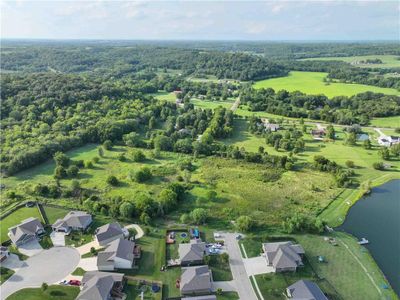 Aerial view featuring a water view | Image 3