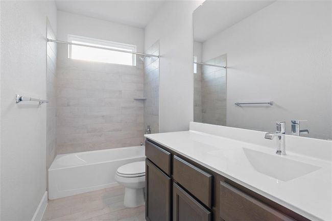This photo is for illustrative purposes only and is not to be considered an exact replica of the finished home. Rendering does not match the finished product in terms of features, colors, landscaping, etc. Pricing, specifications, square footage and materials are subject to change at any time and without notice. | Image 4