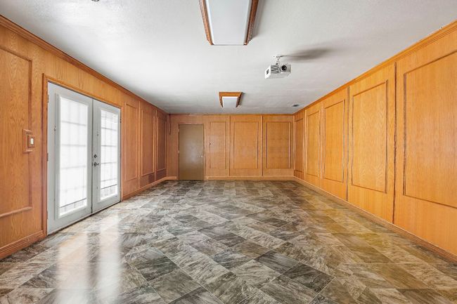 Pool house room could be used as a big bedroom. | Image 30