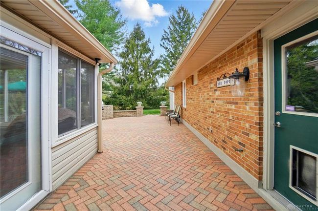 enter paver patio from kitchen | Image 80