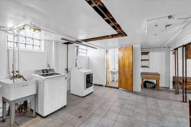 Separate laundry area, washer & dryer stay | Image 21