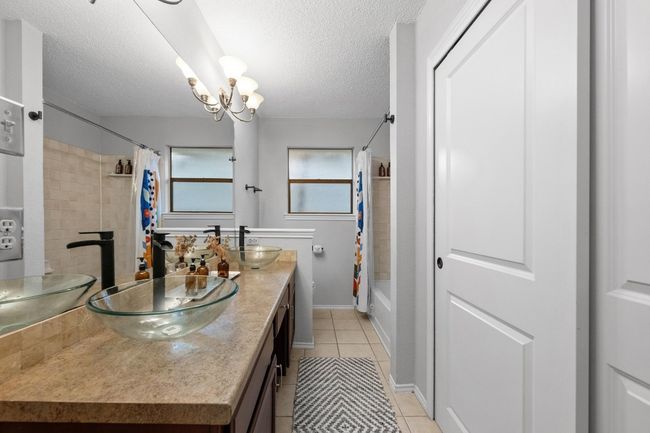 Primary bathroom with dual sinks and two large closets | Image 18