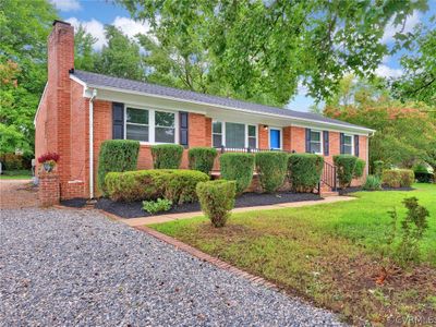 Single story home featuring a front yard | Image 2