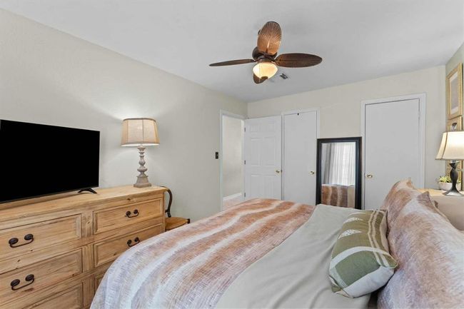 Bright and comfortable bedroom with great natural light and plenty of space to personalize | Image 19