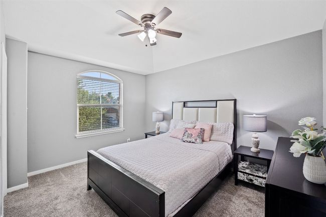 Bedroom featuring carpet floors and a ceiling fan | Image 17