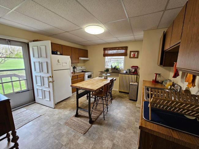 Kitchen/Deck Access/Unit 1 | Image 10