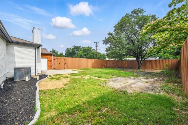 View of yard with central air condition unit | Image 36