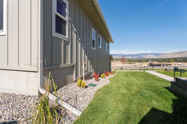 View of green lawn with a mountain view | Image 8