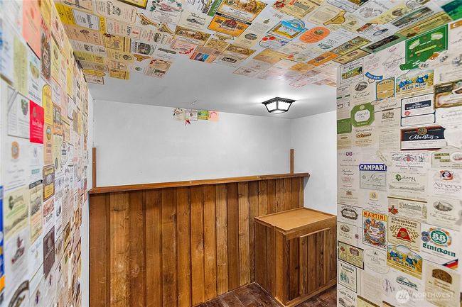Wine cellar downstairs, yes those are cool wine labels on the wall | Image 30