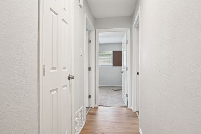 Hallway to bedrooms | Image 19