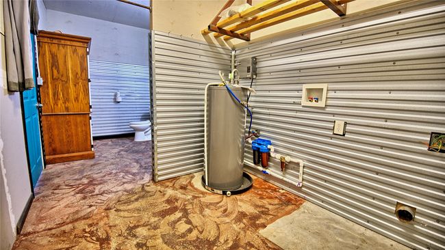 Laundry area off bathroom | Image 8