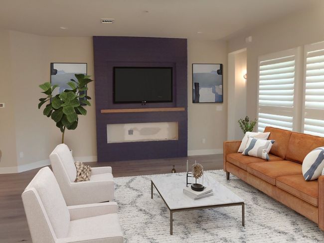Living room with wood finished floors | Image 20