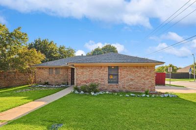 Single story home featuring a front lawn | Image 2