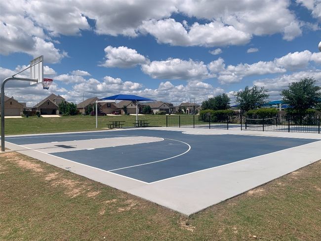 View of basketball court featuring community basketball court and a residential view | Image 32
