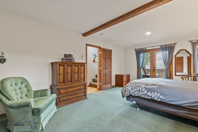 Main House Main Floor Bedroom - direct access to front deck | Image 21