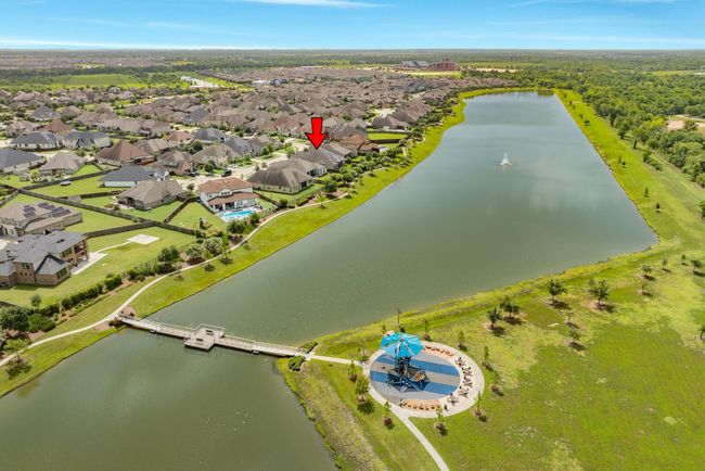 adventure lake is 20 acres and stocked has a swing bridge to the playground | Image 45