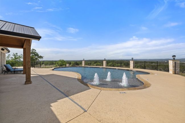 Community pool featuring a patio | Image 24